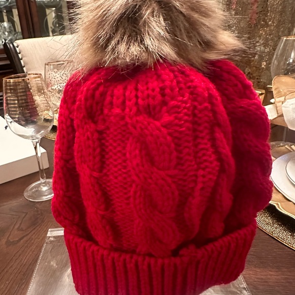 New in packaging. Women’s bright red puff beanie. Make your best offer - Picture 3 of 4
